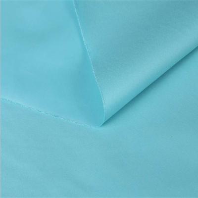 Polyester plain weave solid dyed swim short fabric